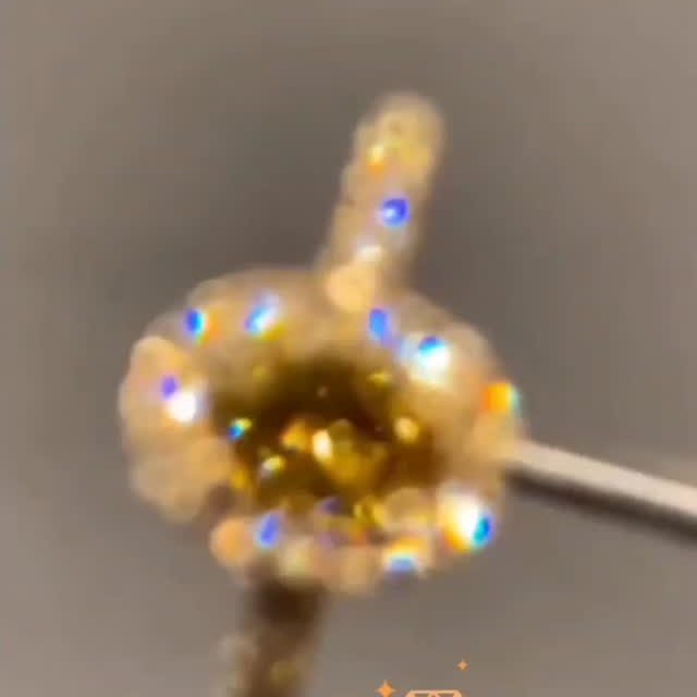 just finished this halo ring with a stunning center stone in the form of an oval brilliant with yellow/green and brownish shades of 0.60 ct.

Ud on this, since 0.26 ct. Tw-vs (around and down the side. There is only this one.
.
.
DM to make it yours or design a custom piece. Save & share for unique jewelry inspiration!
You can customise your order in all shape and size.. 
Made By Order!! // Beautiful Bracelets, Rings 💍 Jewellery ✨
.
.
14K Yellow Gold 
.
+++Follow for more jewelry content! #ShreeRajGroup